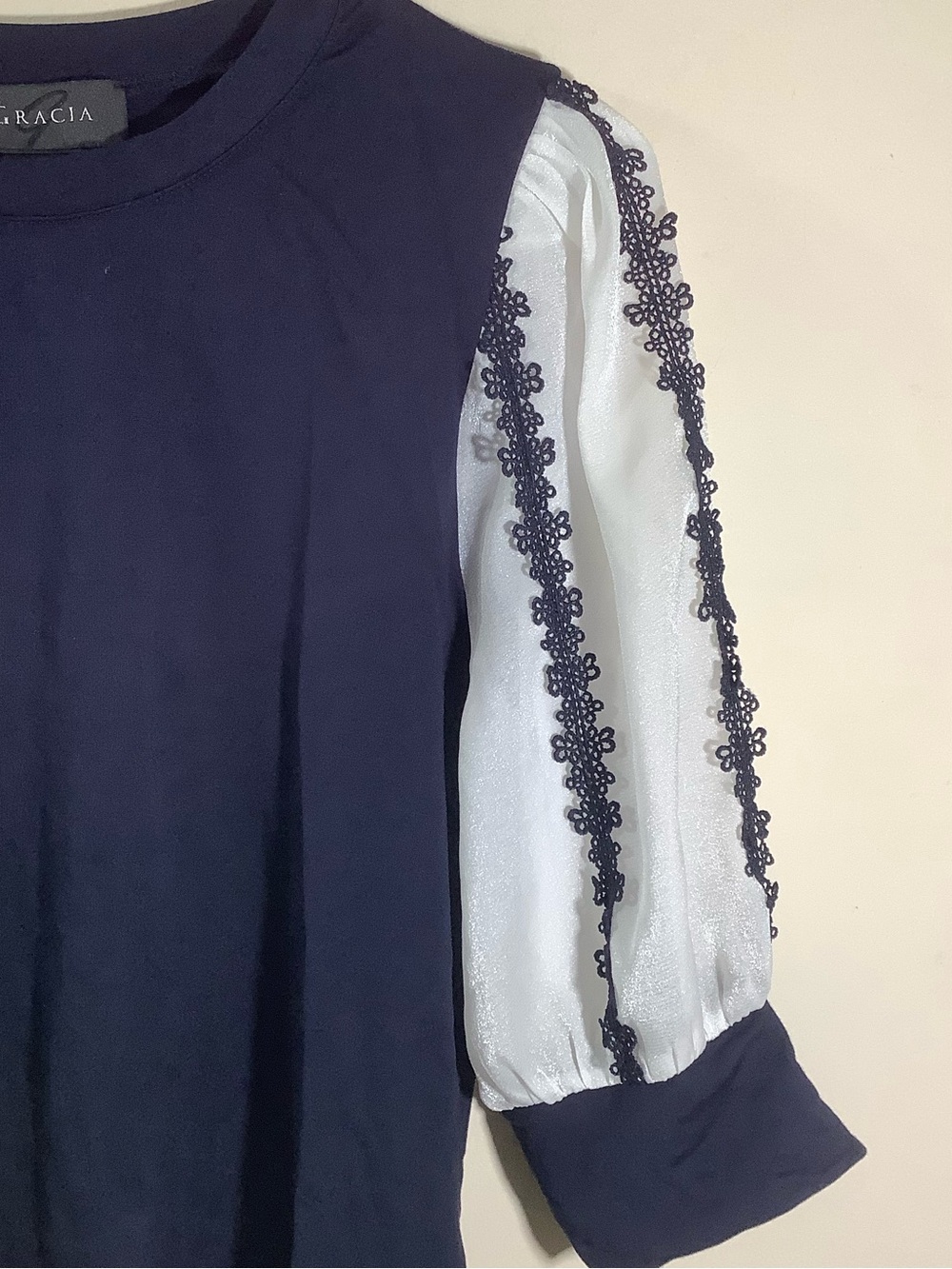 Gracia Navy Knit Top with White Sheer Lace Puff Sleeves - Picture 7 of 9